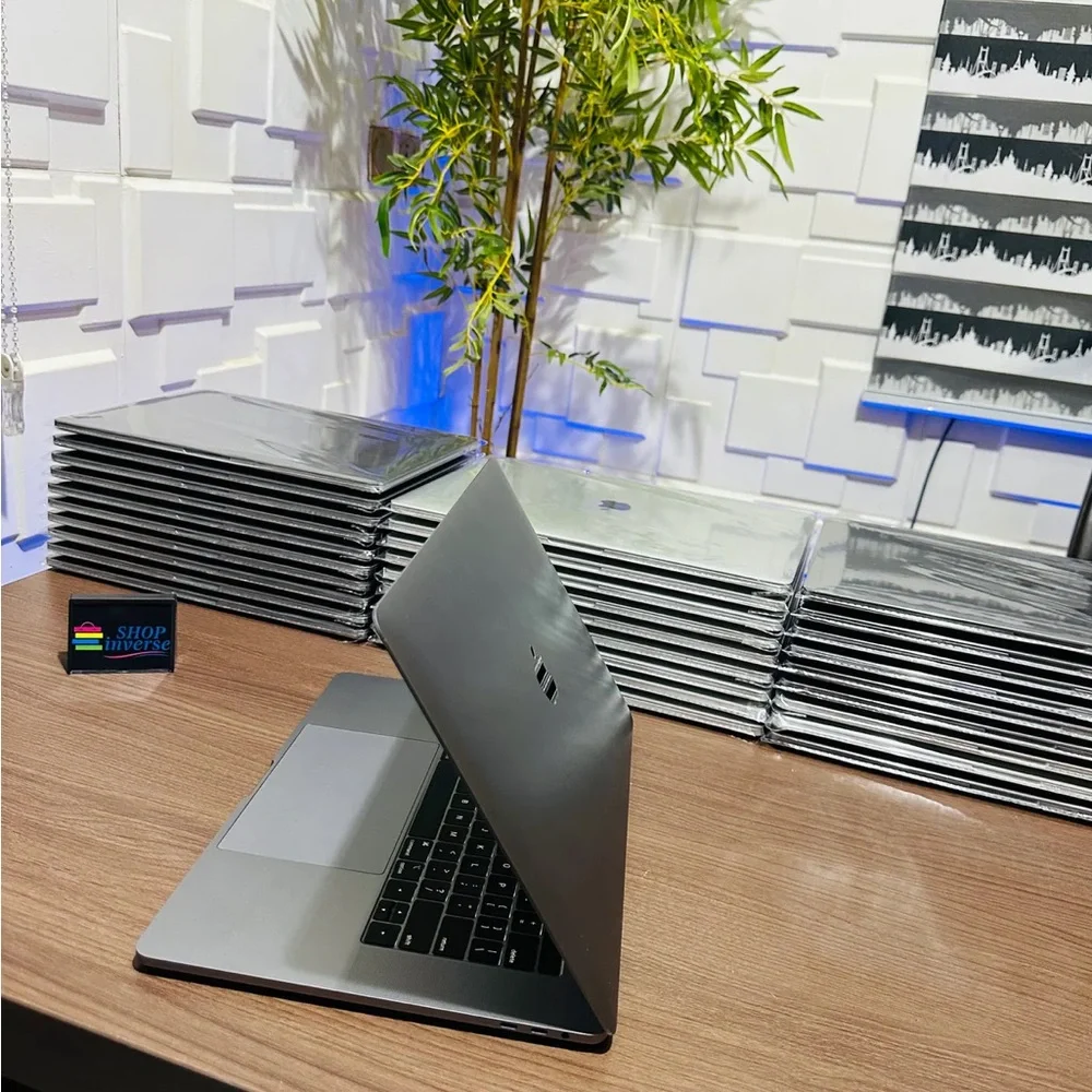 Apple MacBook with Silver Body and Black Keyboard